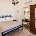 Day One Fira Mansion