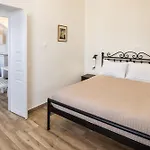 Day One Fira Mansion