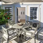 Day One Fira Mansion